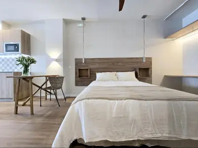 Cama o camas de una habitación en Lhome Macarena Centro Histórico