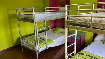 Cama o camas de una habitación en Cortijo rural con piscina y barbacoa Archidona