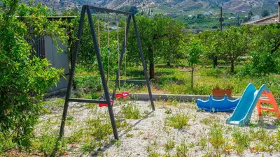 Zona de juegos infantil en Villa Toliso Álora by Ruralidays