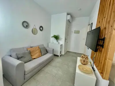 Una televisión o centro de entretenimiento en Geysotur Almogavares Suite