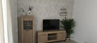 Una televisión o centro de entretenimiento en Fuente de la Villa Apartamento