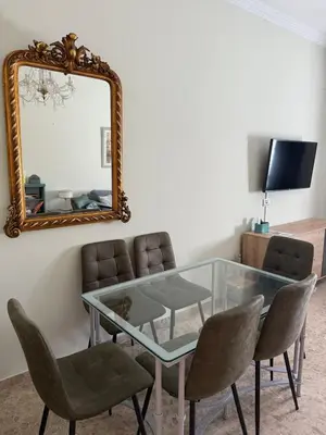 Una televisión o centro de entretenimiento en Apartamento El Barranco