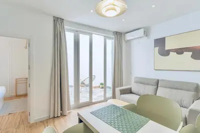 Zona de estar de Deanes Califa Suites