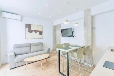 Zona de estar de Deanes Califa Suites