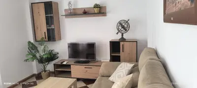 Una televisión o centro de entretenimiento en Fuente la Villa 2 Apartamento, Calle Carmen 18 C