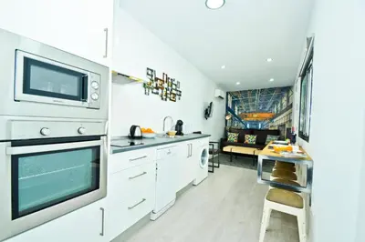 Una cocina o zona de cocina en Morgado Suites
