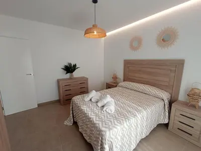 Cama o camas de una habitación en Alojamientos RAICES DEL SUR