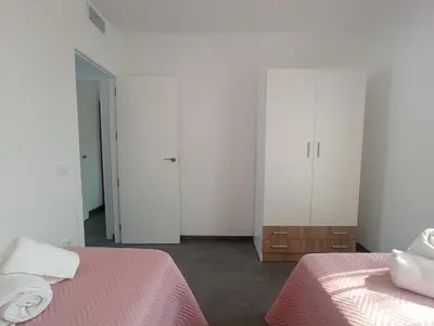 Cama o camas de una habitación en Alojamientos RAICES DEL SUR