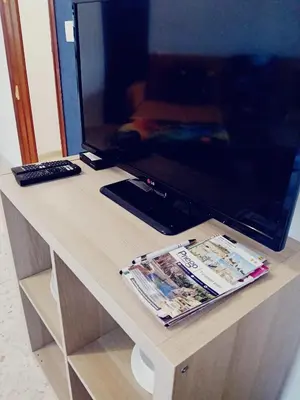 Una televisión o centro de entretenimiento en Studio Nova