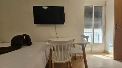 Una televisión o centro de entretenimiento en Estudio para pareja en Jaén