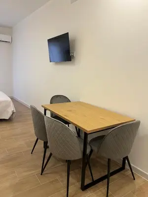 Una televisión o centro de entretenimiento en Boutique Apartaments Córdoba