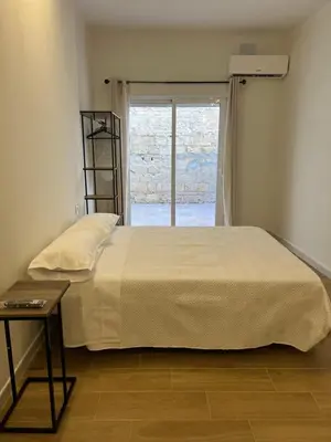 Cama o camas de una habitación en Boutique Apartaments Córdoba
