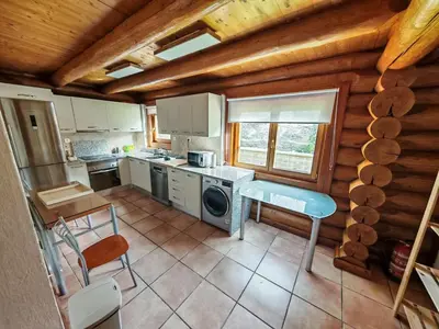 Una cocina o zona de cocina en Wood Sunrise