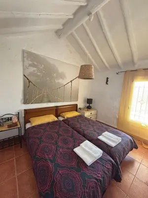 Cama o camas de una habitación en Casa Cerca del cielo
