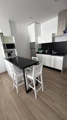 Una cocina o zona de cocina en Oliva Suite Apartamentos