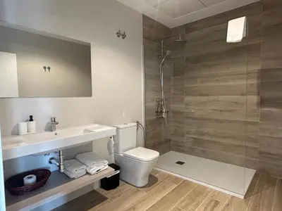 Un baño de Oliva Suite Apartamentos