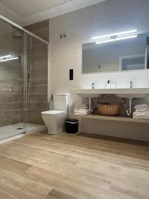 Un baño de Oliva Suite Apartamentos