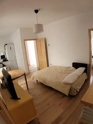Cama o camas de una habitación en Apartamento con WiFi y aparcamiento privado
