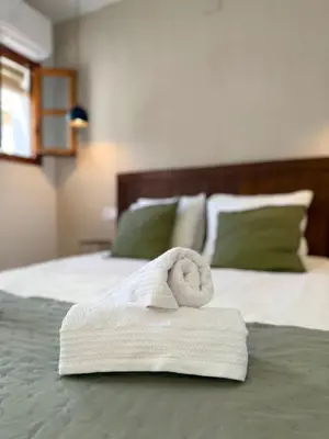 Cama o camas de una habitación en Apartamentos Puerta de Sefarad