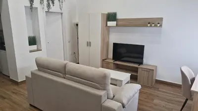 Una televisión o centro de entretenimiento en Reding Loft