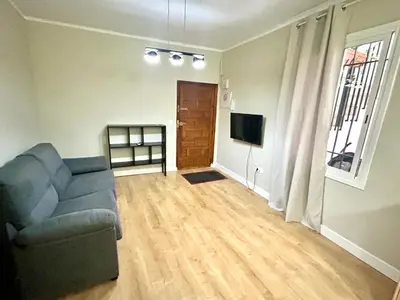 Una televisión o centro de entretenimiento en Le Sophie HOME