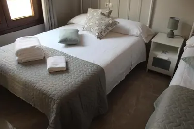 Cama o camas de una habitación en Casa Rural de Piedra
