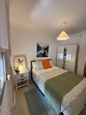 Cama o camas de una habitación en Precioso apartamento totalmente reformado