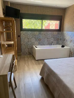Cama o camas de una habitación en Apartamento en Sevilla DELUXURYROOM