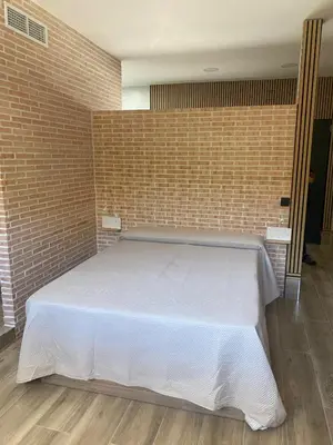 Cama o camas de una habitación en Apartamento en Sevilla DELUXURYROOM