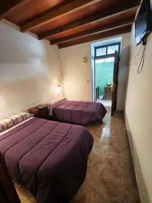 Cama o camas de una habitación en Alojamiento Acuario