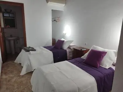 Cama o camas de una habitación en Alojamiento Acuario