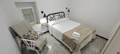 Cama o camas de una habitación en La Casa de Antonina