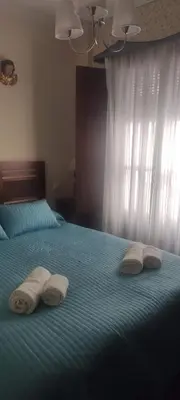 Cama o camas de una habitación en La Casa de Paquita