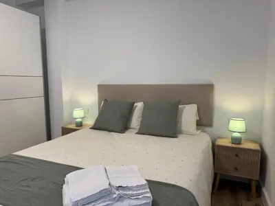Cama o camas de una habitación en Entre Plazas Stay