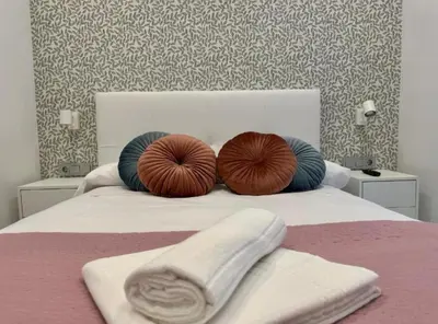 Cama o camas de una habitación en Alexein Plaza de las Tendillas