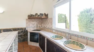 Una cocina o zona de cocina en Casa Rural Lucena
