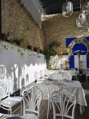 Zona de estar de La Casa del Gallo Alojamientos by Taberna Bolero
