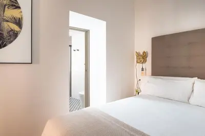 Cama o camas de una habitación en Casa del Gitano by Época Suites