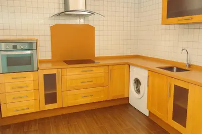 Una cocina o zona de cocina en Apartamentos El Paso