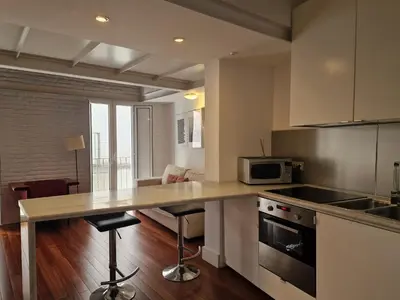 Una cocina o zona de cocina en Elegant duplex in the heart of Seville