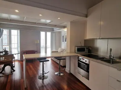 Una cocina o zona de cocina en Elegant duplex in the heart of Seville