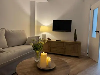 Una televisión o centro de entretenimiento en Cruz Conde Guiris Home