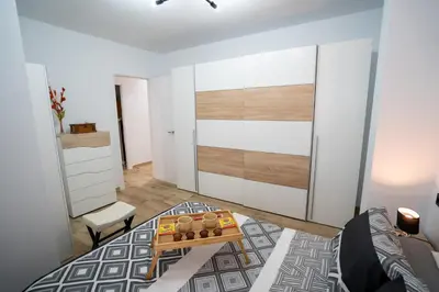 Cama o camas de una habitación en Encanto en Iznájar con terraza y vistas a la montaña