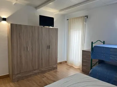 Cama o camas de una habitación en Apartamento Deluxe Cantillana