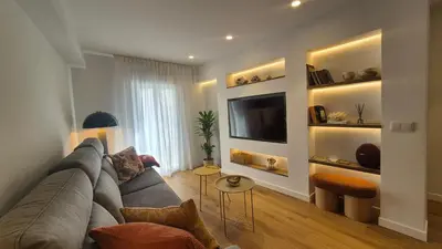 Una televisión o centro de entretenimiento en Puerta a los Patios