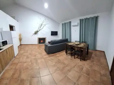 Una televisión o centro de entretenimiento en Casas rurales La Colada