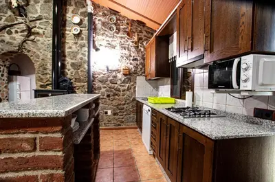 Una cocina o zona de cocina en Alojamiento Rural Los Abuelos del Navaltorno