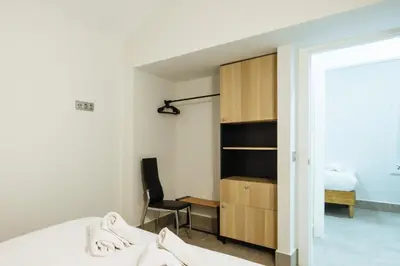 Cama o camas de una habitación en Apartamentos Trinidad