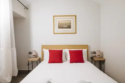 Cama o camas de una habitación en Apartamentos Trinidad