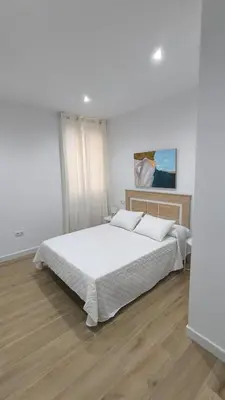 Cama o camas de una habitación en Apartamento Santísima Trinidad